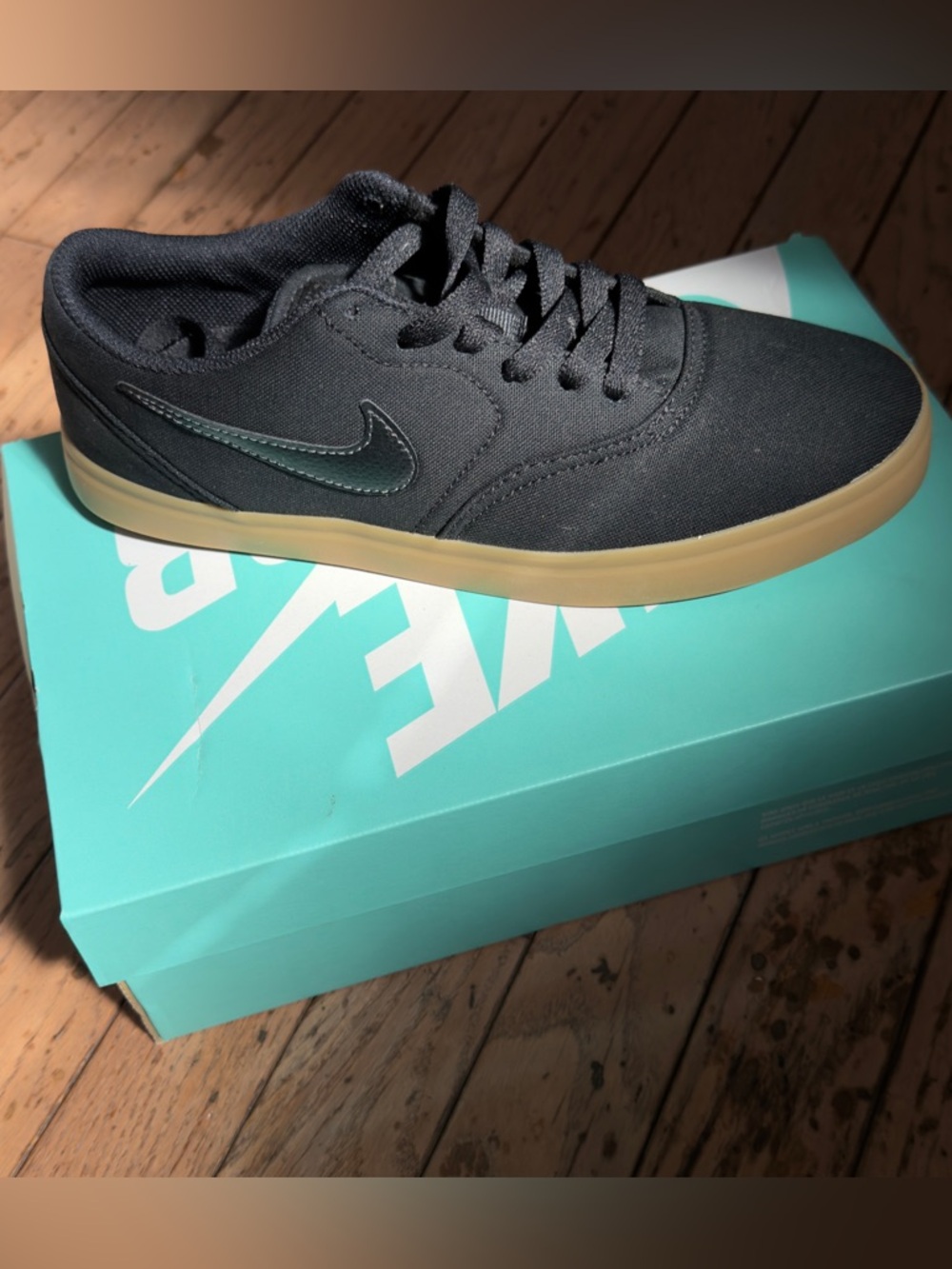 Nike Men’s Low-Top Canvas Sneakers in Black with Gum Sole and Teal Swoosh